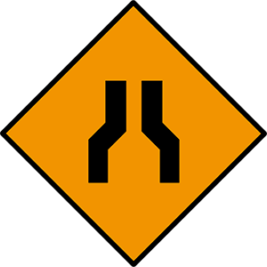 Road narrows on both sides
